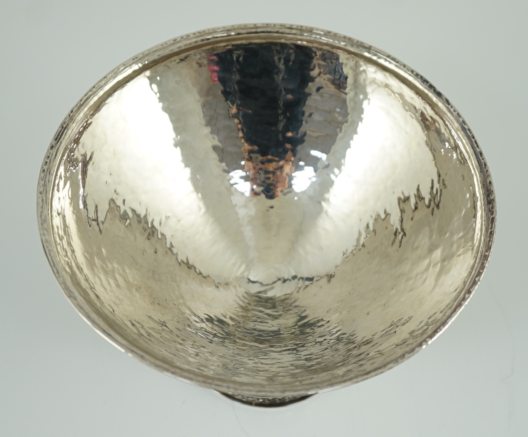 A George V Omar Ramsden planished silver pedestal bowl